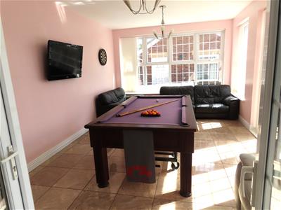 SUN-LOUNGE / GAMES-ROOM TO REAR
